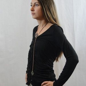 long sleeve reversible black top with braid.